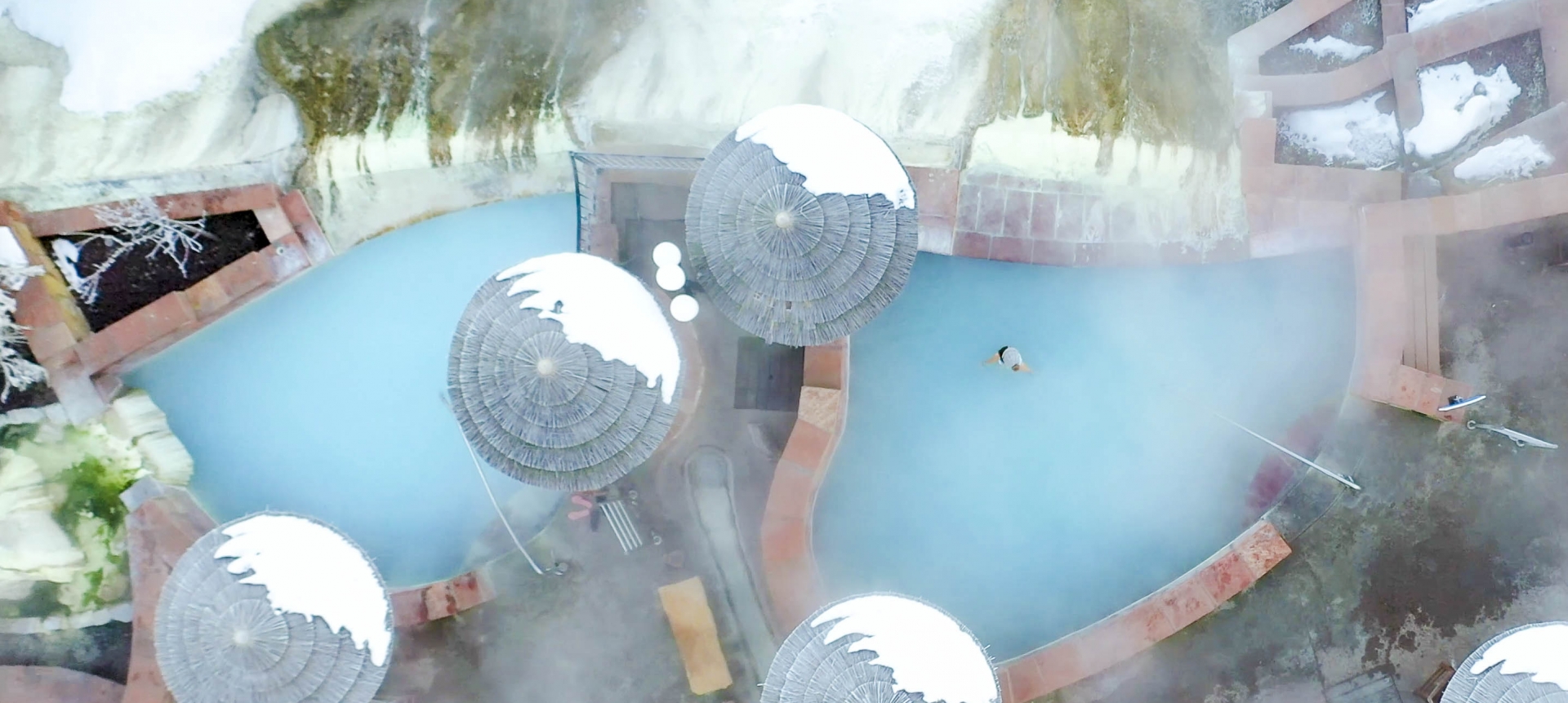 Aerial view of the hot spring pools at The Springs Resort